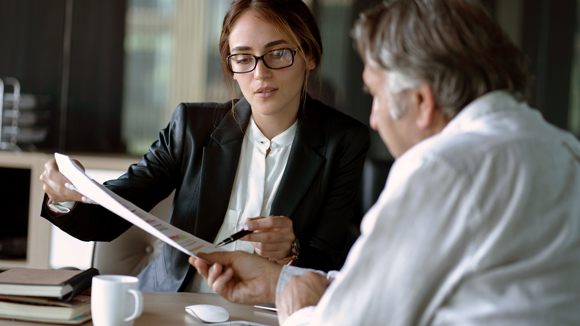 Business manager presenting new data to her boss
